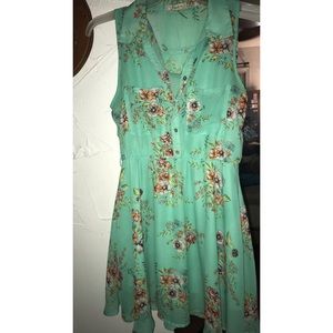 Turquoise mini dress with floral design